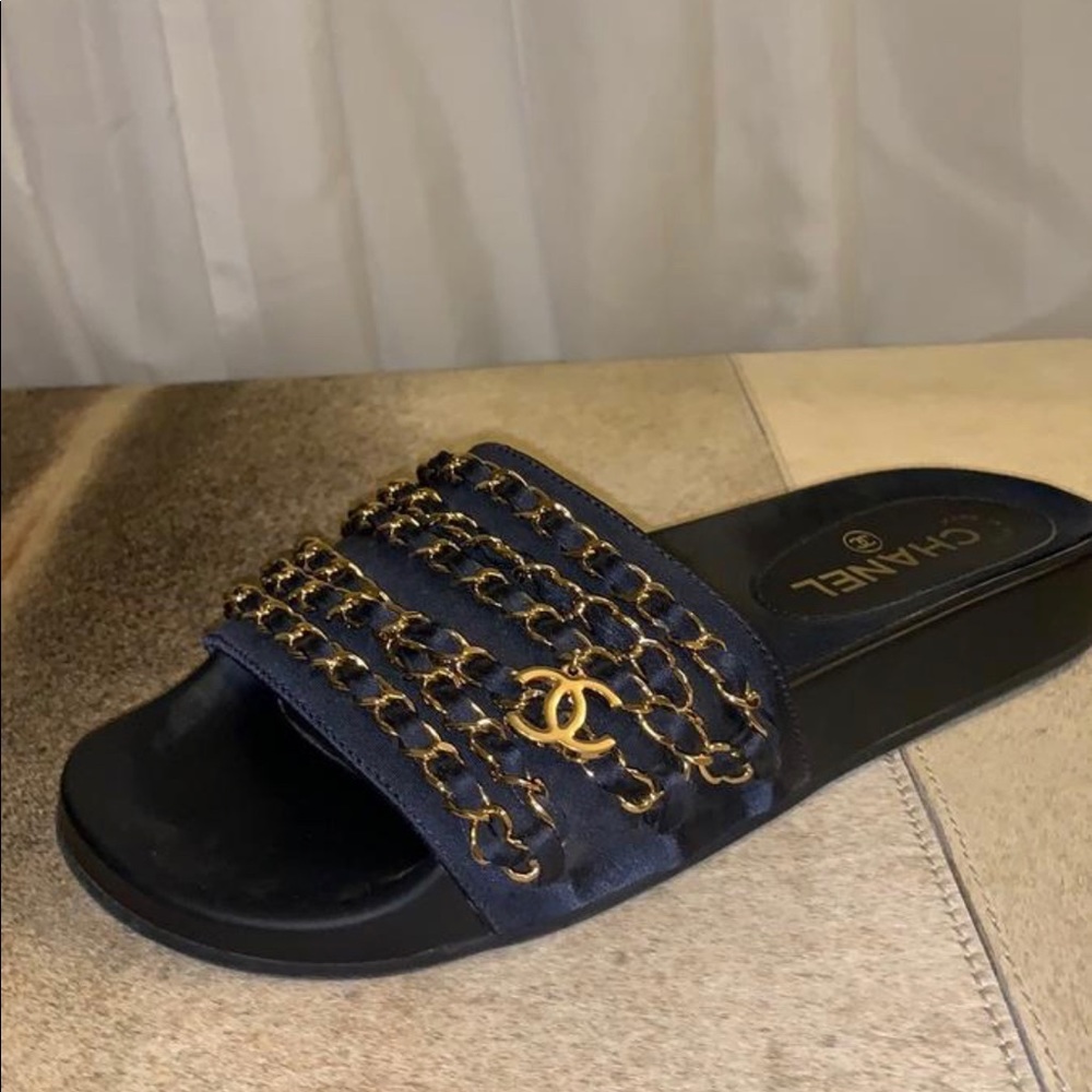 Nave blue Chanel Mules with classic gold hardware